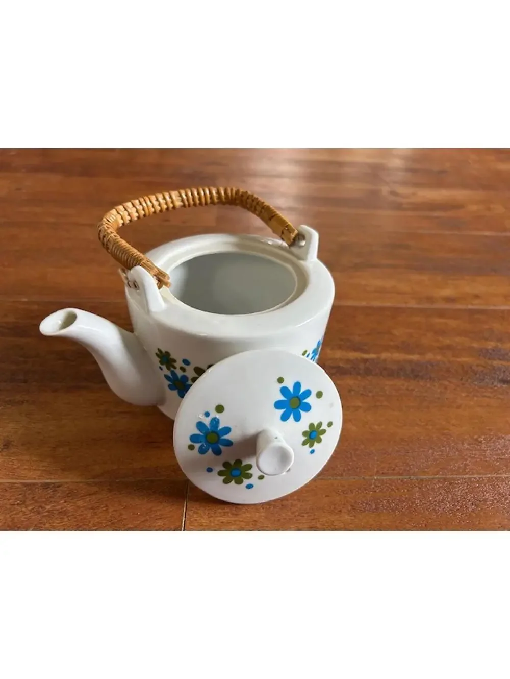 Vintage Ceramic Teapot with Blue and Green Floral Design and Woven Handle